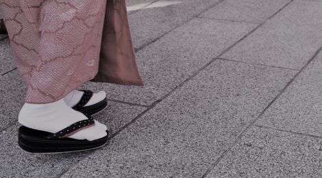 Photo of feet in traditional kimono at Asakusa Shrine in Tokyo, Japan